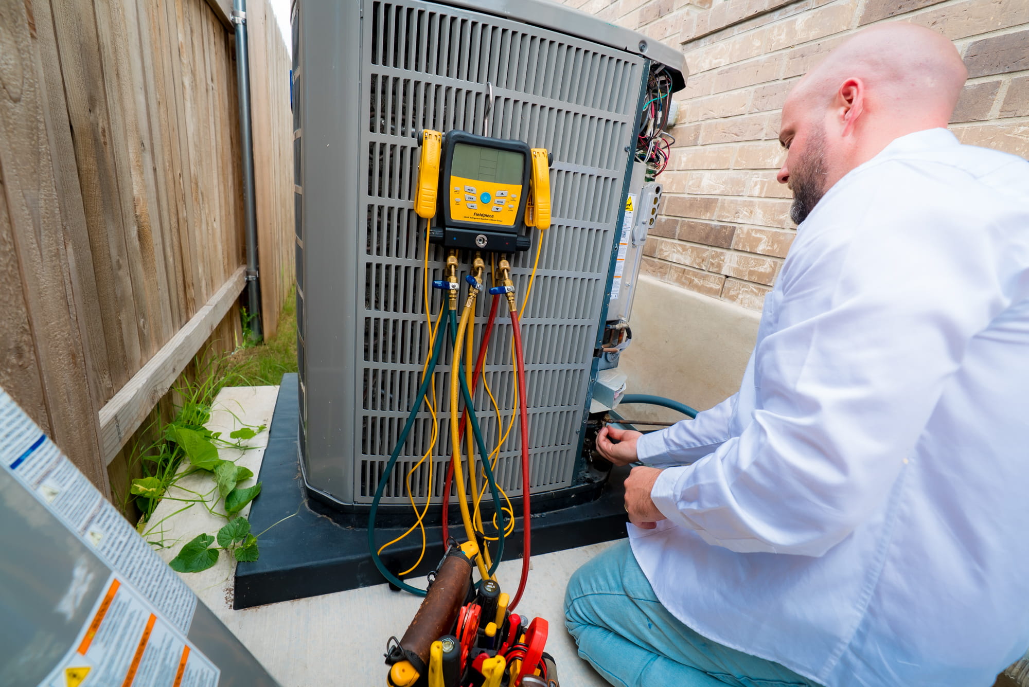 HVAC technician servicing heating unit